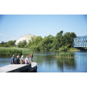 Udsigt fra Storkeengen ved Guden�en i Randers med Den Bl� Bro og Randers Regnskov