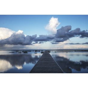 Aften ved badebro og sommerhus omrde i ster Hurup