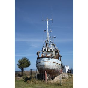 Vrag af fiskekutter p Egense havn ved Limfjorden