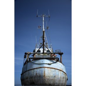 Vrag af fiskekutter p Egense havn ved Limfjorden