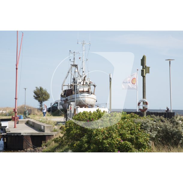 Vrag af fiskekutter p Egense havn ved Limfjorden